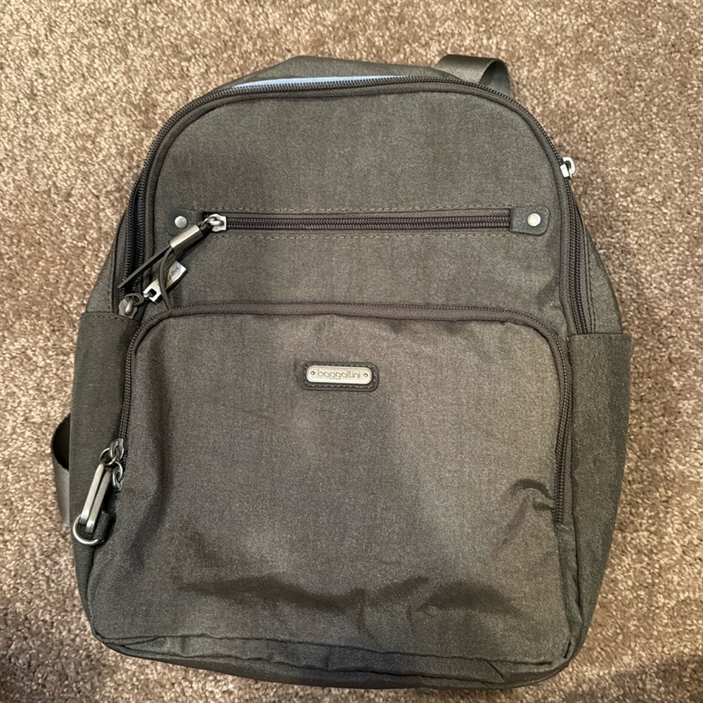 Baggallini backpack with anti theft zippers, gray, new